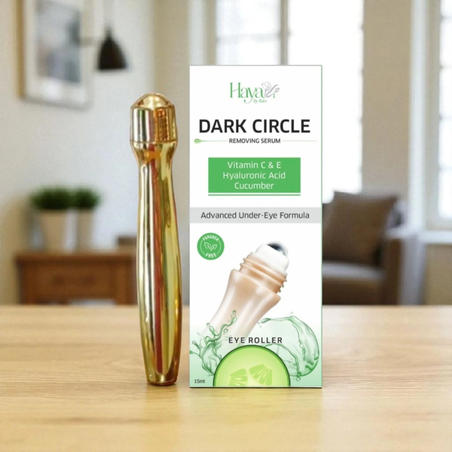 Haya by Rabi 15ml eye roller serum for dark circles displayed on a wooden surface.
