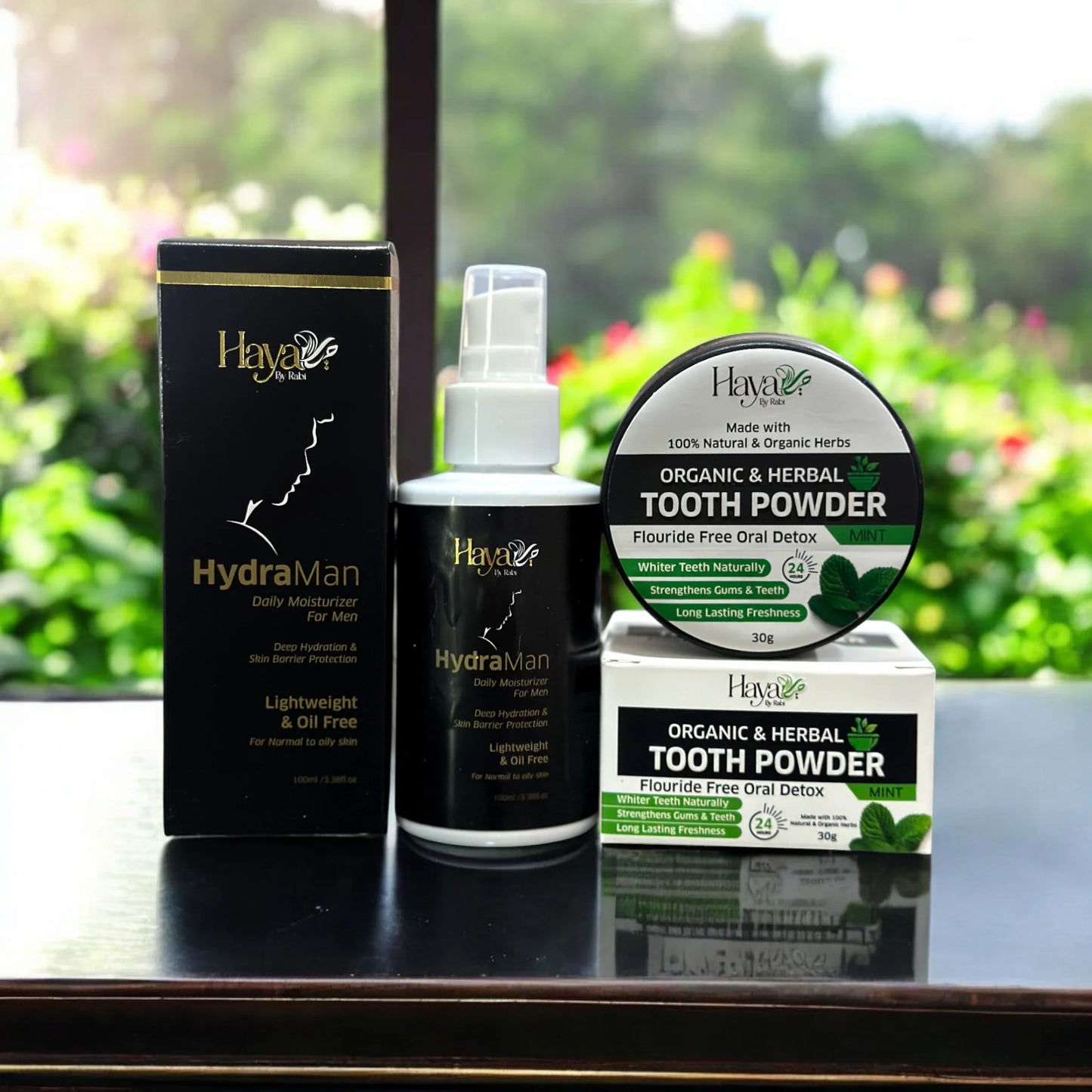 Haya by Rabi HydraMan oil-free daily moisturizer for men and organic mint herbal tooth powder.