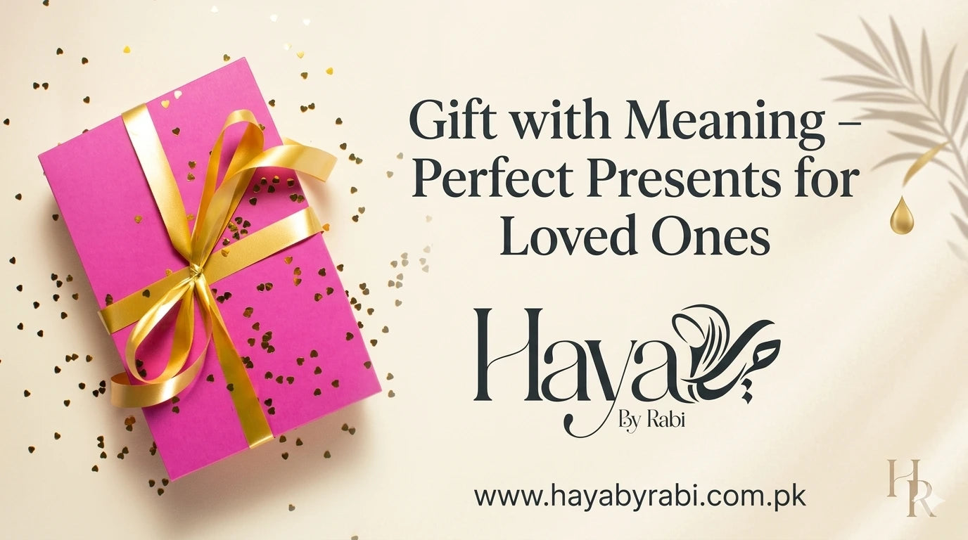 Pink gift box with gold ribbon from Haya by Rabi perfect for loved ones.