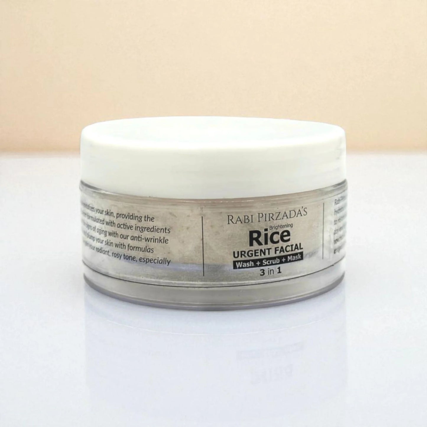 Side view of Rabi Pirzada’s Brightening Rice Urgent Facial jar on a white surface.
